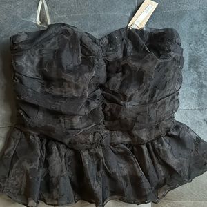 Cute strapless girly peplum style top! Black size large